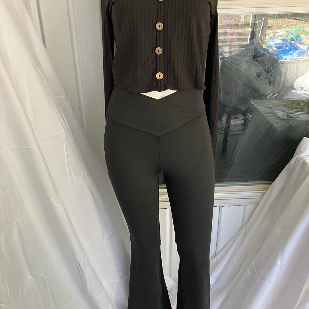 Size S Elegant Black Women's Pants and ribbed shirt with decorative buttons.